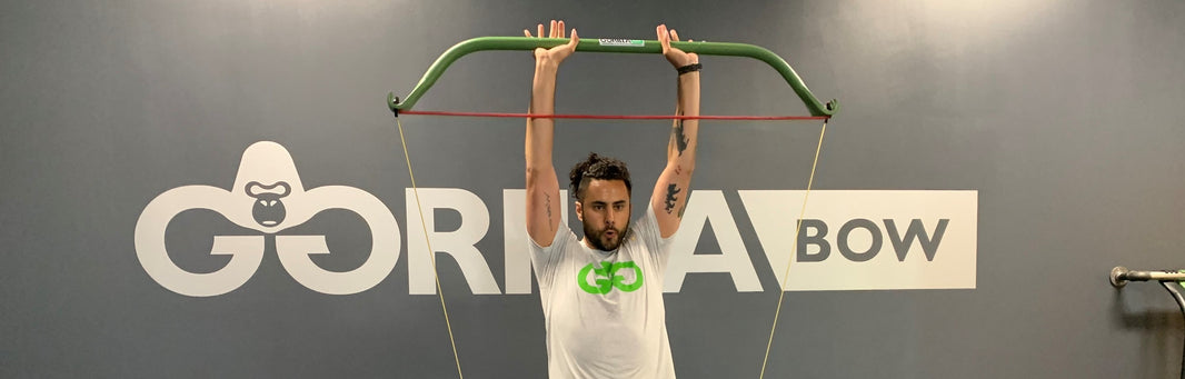 shoulder workouts using gorilla bow resistance bands and bar