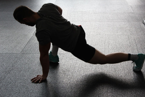 The Complete Guide To Knee Tucks: Building Core Strength